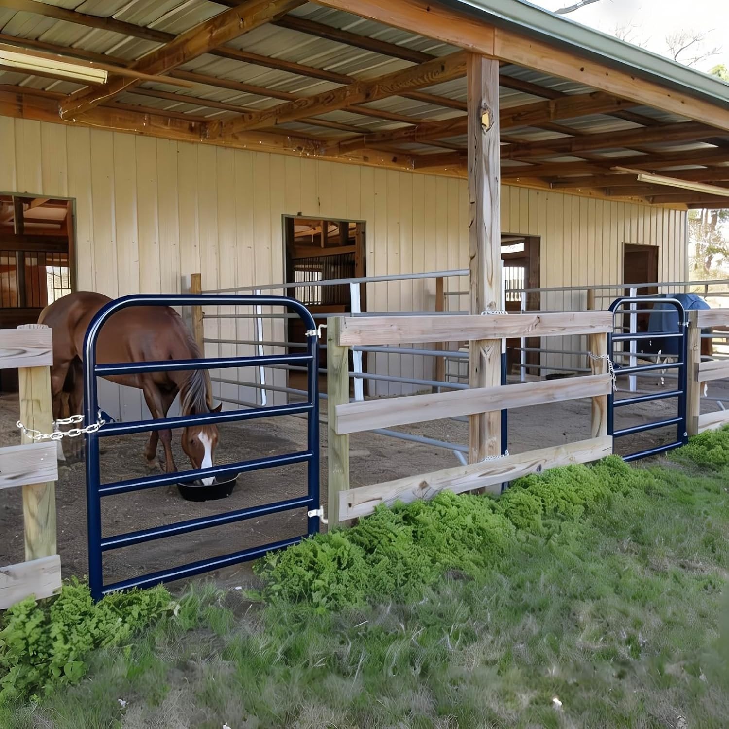 Farm tube gate in use at a barn with horse feeding